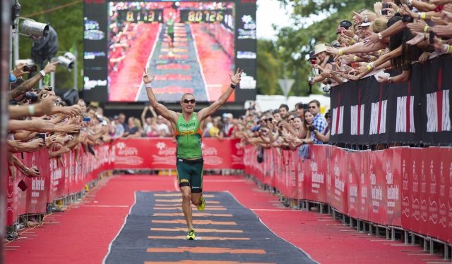 Luke McKenzie salutes crowd at Cairns Airport IRONMAN Cairns Luke McKenzie salutes crowd at Cairns Airport IRONMAN Cairns