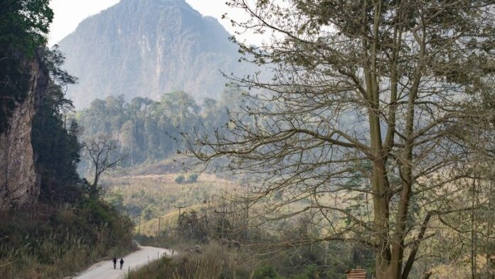 Rebecca Rusch and Huyen Nguyen ride the Ho Chi Minh Trail for the feature film project 'Blood Road' in Vietnam, Laos, and Cambodia in March, 2015. // Josh Letchworth/Red Bull Content Pool // P-20170523-00081