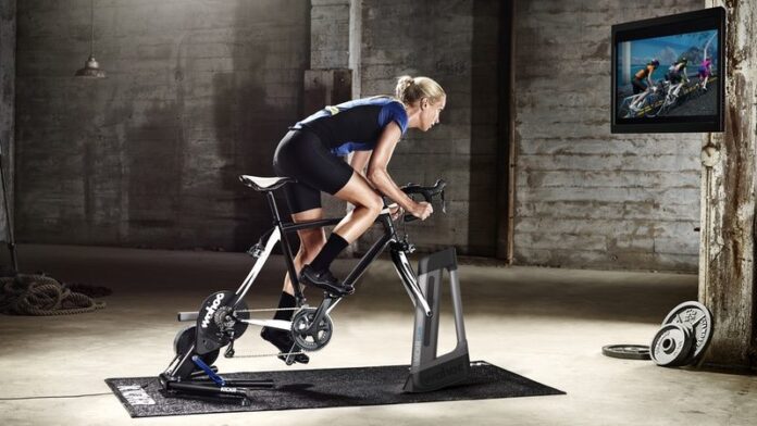 Wahoo KICKR CLIMB rider with Zwift