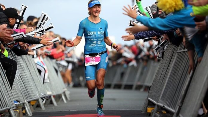 IRONMAN Wales TENBY, WALES - SEPTEMBER 10: Lucy Gossage of Great Britain celebrates winning IRONMAN Wales on September 10, 2017 in Tenby, Wales. (Photo by Bryn Lennon/Getty Images for IRONMAN)