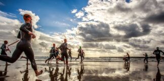 Mossel Bay to host IRONMAN South Africa as 2027 calendar expands IRONMAN South Africa - Athletes at Standard Bank IRONMAN 70.3 South Africa, swim start - Photo by Chris Hitchcock - IRONMAN