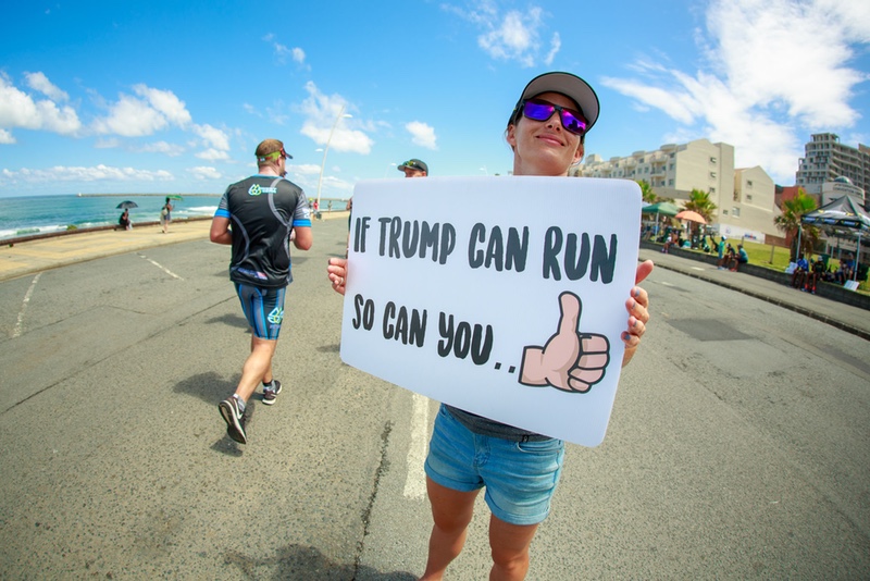 Tongue-in-cheek encouragement at Standard Bank IRONMAN 70.3 South Africa - Photo by Chris Hitchcock - IRONMAN