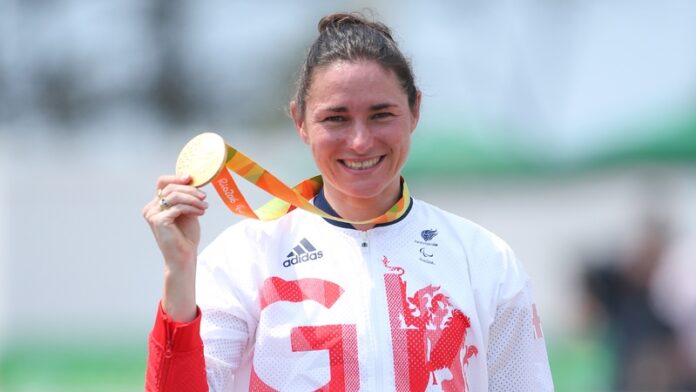 Picture by Alex Whitehead/SWpix.com - 14/09/2016 - 2016 Rio Paralympic Games - Road Cycling - Pontal, Rio de Janeiro, Brazil - Great Britain's Dame Sarah Storey celebrates winning Gold in the Women's C5 Time Trial.
