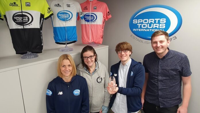 191122_Sports Tours International team with award
