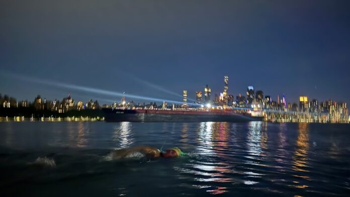 Mohamed Lahna completes Manhattan swim to kickstart Triathlon Across America challenge - image credit Nathaniel Johnston Photography