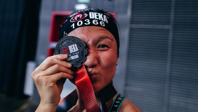 DEKA athlete with medal DEKA athlete with medal